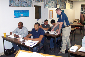 Students working with an instructor during class