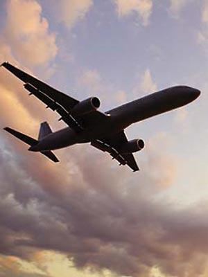 Passenger jet in silhouette